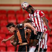 20 April 2021; James Akintunde of Derry City in action against Daniel Cleary of Dundalk during the SSE Airtricity League Premier Division match between Derry City and Dundalk at the Ryan McBride Brandywell Stadium in Derry. Photo by Stephen McCarthy/Sportsfile