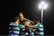20 April 2021; Shamrock Rovers players, including Sean Hoare, top, celebrate after their side's first goal, scored by Danny Mandroiu, hidden, during the SSE Airtricity League Premier Division match between Drogheda United and Shamrock Rovers at United Park in Drogheda, Louth. Photo by Ben McShane/Sportsfile