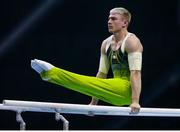 23 April 2021; Adam Steele of Ireland competes on the Parallel Bars in the men's artistic All-Around Final during day three of the 2021 European Championships in Artistic Gymnastics at St. Jakobshalle in Basel, Switzerland. Photo by Thomas Schreyer/Sportsfile