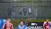 23 April 2021; Spectators look on from outside the ground during the SSE Airtricity League Premier Division match between Finn Harps and St Patrick's Athletic at Finn Park in Ballybofey, Donegal. Photo by Piaras Ó Mídheach/Sportsfile