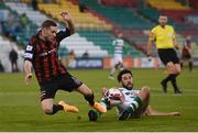 23 April 2021; Liam Burt of Bohemians is tackled by Roberto Lopes of Shamrock Rovers during the SSE Airtricity League Premier Division match between Shamrock Rovers and Bohemians at Tallaght Stadium in Dublin. Photo by Stephen McCarthy/Sportsfile