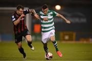 23 April 2021; Aaron Greene of Shamrock Rovers in action against Rob Cornwall of Bohemians during the SSE Airtricity League Premier Division match between Shamrock Rovers and Bohemians at Tallaght Stadium in Dublin. Photo by Stephen McCarthy/Sportsfile