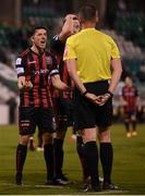 23 April 2021; Bohemians players Rob Cornwall and Keith Buckley react to referee Paul McLaughlin after he awarded a penalty to Shamrock Rovers during the SSE Airtricity League Premier Division match between Shamrock Rovers and Bohemians at Tallaght Stadium in Dublin. Photo by Stephen McCarthy/Sportsfile