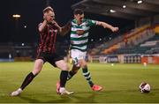 23 April 2021; Aaron Greene of Shamrock Rovers in action against Ciaran Kelly of Bohemians during the SSE Airtricity League Premier Division match between Shamrock Rovers and Bohemians at Tallaght Stadium in Dublin. Photo by Stephen McCarthy/Sportsfile