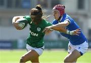 24 April 2021; Amee Leigh Murphy-Crowe of Ireland is tackled by Victory Ostuni Minuzzi of Italy during the Women's Six Nations Rugby Championship Play-off match between Ireland and Italy at Energia Park in Dublin. Photo by Matt Browne/Sportsfile