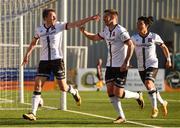 24 April 2021; David McMillan of Dundalk celebrates after scoring his side's first goal with team-mates Patrick McEleney, centre, and Han Jeongwoo, right, during the SSE Airtricity League Premier Division match between Dundalk and Drogheda United at Oriel Park in Dundalk, Louth. Photo by Ben McShane/Sportsfile
