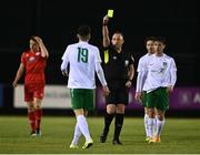 23 April 2021; Referee Alan Patchell shows a yellow card to Luke McWilliams of Cabinteely, 19, during the SSE Airtricity League First Division match between Cabinteely and Shelbourne at Stradbrook Park in Blackrock, Dublin. Photo by Sam Barnes/Sportsfile