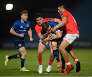 24 April 2021; Garry Ringrose of Leinster is tackled by Joey Carbery, left, and Damian de Allende of Munster during the Guinness PRO14 Rainbow Cup match between Leinster and Munster at the RDS Arena in Dublin. Photo by Stephen McCarthy/Sportsfile