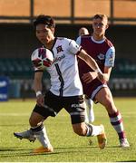 24 April 2021; Han Jeongwoo of Dundalk and Killian Phillips of Drogheda United during the SSE Airtricity League Premier Division match between Dundalk and Drogheda United at Oriel Park in Dundalk, Louth. Photo by Ben McShane/Sportsfile