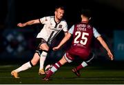24 April 2021; Cameron Dummigan of Dundalk in action against Ryan O'Shea of Drogheda United during the SSE Airtricity League Premier Division match between Dundalk and Drogheda United at Oriel Park in Dundalk, Louth. Photo by Ben McShane/Sportsfile