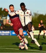24 April 2021; Junior Ogedi-Uzokwe of Dundalk and Dane Massey of Drogheda United during the SSE Airtricity League Premier Division match between Dundalk and Drogheda United at Oriel Park in Dundalk, Louth. Photo by Ben McShane/Sportsfile