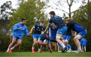 27 April 2021; Ed Byrne with the support of Cian Kelleher, left, and Jordan Larmour is tackled by Ryan Baird during Leinster rugby squad training at UCD in Dublin. Photo by Stephen McCarthy/Sportsfile