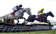 28 April 2021; Galopin Des Champs, right, with Paul Townend up, jumps the sixth on their way to winning the Irish Mirror Novice Hurdle, from eventual second place Gentlemansgame, left, with Mark Walsh up, during day two of the Punchestown Festival at Punchestown Racecourse in Kildare. Photo by David Fitzgerald/Sportsfile