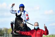 28 April 2021; Jockey Sam Twiston-Davies and groom Scott Marshall celebrate with Clan Des Obeaux after winning the Ladbrokes Punchestown Gold Cup during day two of the Punchestown Festival at Punchestown Racecourse in Kildare. Photo by David Fitzgerald/Sportsfile