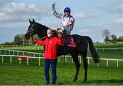 28 April 2021; Jockey Sam Twiston-Davies and groom Scott Marshall celebrate with Clan Des Obeaux after winning the Ladbrokes Punchestown Gold Cup during day two of the Punchestown Festival at Punchestown Racecourse in Kildare. Photo by David Fitzgerald/Sportsfile