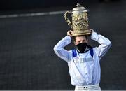 28 April 2021; Jockey Sam Twiston-Davies celebrates with the trophy after riding Clan Des Obeaux to victory the Ladbrokes Punchestown Gold Cup during day two of the Punchestown Festival at Punchestown Racecourse in Kildare. Photo by David Fitzgerald/Sportsfile