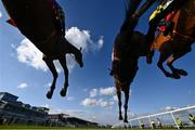 28 April 2021; Clan Des Obeaux, centre, with Sam Twiston-Davies up, jumps the sixth on their way to winning the Ladbrokes Punchestown Gold Cup, from Kemboy, left, with Danny Mullins up, and Melon, right, with Patrick Mullins up, during day two of the Punchestown Festival at Punchestown Racecourse in Kildare. Photo by David Fitzgerald/Sportsfile