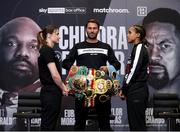 29 April 2021; Katie Taylor and Natasha Jonas square off, in the company of promoter Eddie Hearn, during a press conference at the Matchroom Boxing fight hotel in Manchester, England, ahead of their WBC, WBA, IBF and WBO female lightweight title fight on Saturday Night. Photo by Mark Robinson / Matchroom Boxing via Sportsfile