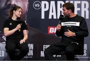 29 April 2021; Katie Taylor and promoter Eddie Hearn during a press conference at the Matchroom Boxing fight hotel in Manchester, England, ahead of her WBC, WBA, IBF and WBO female lightweight title fight against Natasha Jonas on Saturday Night. Photo by Mark Robinson / Matchroom Boxing via Sportsfile