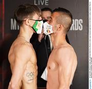 29 April 2021; Michael Conlan, left, and Ionut Balut face-off prior to their super-bantamweight bout at York Hall in London, England. Photo by Queensberry Promotions via Sportsfile