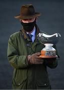 29 April 2021; Trainer Willlie Mullins with the trophy after sending out Energumene to win the Ryanair Novice Steeplechase during day three of the Punchestown Festival at Punchestown Racecourse in Kildare. Photo by Harry Murphy/Sportsfile