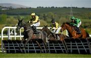 30 April 2021; Gaillard Du Mesnil, with Paul Townend up, left, jumps the last ahead of Ganapathi, with Bryan Cooper up, centre, and Ashdale Bob, with Robbie Power up, on their way to winning the Alanna Homes Champion Novice Hurdle during day four of the Punchestown Festival at Punchestown Racecourse in Kildare. Photo by Harry Murphy/Sportsfile