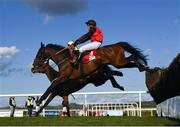 30 April 2021; Bob And Co, with David Maxwell up, jumps the last on their way to winning the Irish Daily Star Champion Hunters Steeplechase during day four of the Punchestown Festival at Punchestown Racecourse in Kildare. Photo by Harry Murphy/Sportsfile