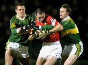 7 February 2004; Dermot Hurley, Cork, in action against Eoin Brosnan, left, and William Kirby, Kerry. Allianz National Football League, Division 1A, Kerry v Cork, Austin Stacks Park, Tralee, Co Kerry. Picture credit; Brendan Moran / SPORTSFILE *EDI*