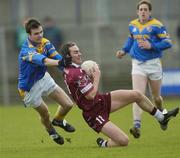 8 February 2004; Martin Flanagan, Westmeath, in action against Longford's David Hanniffy. Allianz National Football League, Division 1A, Westmeath v Longford, Cusack Park, Mullingar, Co. Westmeath. Picture credit; Damien Eagers / SPORTSFILE *EDI*