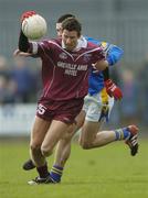 8 February 2004; Denis Glennon, Westmeath, in action against Longford's Enda Ledwith. Allianz National Football League, Division 1A, Westmeath v Longford, Cusack Park, Mullingar, Co. Westmeath. Picture credit; Damien Eagers / SPORTSFILE *EDI*