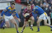 8 February 2004; Damien Gavin, Westmeath, in action against Longford's Liam Keenan, left, and Trevor Smullen. Allianz National Football League, Division 1A, Westmeath v Longford, Cusack Park, Mullingar, Co. Westmeath. Picture credit; Damien Eagers / SPORTSFILE *EDI*