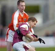 8 February 2004; Michael Donnellan, Galway, in action against Armagh's Andrew McCann. Allianz National Football League, Division 1B, Galway v Armagh, Pearse Stadium, Galway. Picture credit; Ray McManus / SPORTSFILE *EDI*