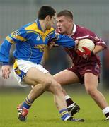 8 February 2004; Alan Mangan, Westmeath, in action against Longford's Enda Ledwith. Allianz National Football League, Division 1A, Westmeath v Longford, Cusack Park, Mullingar, Co. Westmeath. Picture credit; Damien Eagers / SPORTSFILE *EDI*