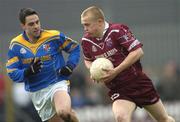 8 February 2004; James Conroy, Westmeath, in action against Longford's Arthur O'Connor. Allianz National Football League, Division 1A, Westmeath v Longford, Cusack Park, Mullingar, Co. Westmeath. Picture credit; Damien Eagers / SPORTSFILE *EDI*