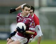 4 January 2004; Derek Heavin, Westmeath, in action against Alan McCarthy, Louth. O'Byrne Cup, Westmeath v Louth, Cusack Park, Mullingar, Co. Westmeath. Picture credit; Ray McManus / SPORTSFILE *EDI*
