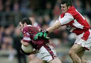 4 January 2004; Fergal Murray, Westmeath, in action against Mark McGeown, Louth. O'Byrne Cup, Westmeath v Louth, Cusack Park, Mullingar, Co. Westmeath. Picture credit; Ray McManus / SPORTSFILE *EDI*