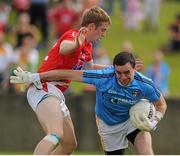 29 June 2013; Chris Kerr, Antrim, in action against Ciarán Byrne, Louth. GAA Football All-Ireland Senior Championship, Round 1, Louth v Antrim, County Grounds, Drogheda, Co. Louth. Picture credit: Dáire Brennan / SPORTSFILE