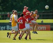29 June 2013; Louth players, left to right, Derek Crilly, Ray Finnegan, and Ronan Carroll, in action against Antrim players, left to right, Anto Healy, John Carron, and Conor Murray. GAA Football All-Ireland Senior Championship, Round 1, Louth v Antrim, County Grounds, Drogheda, Co. Louth. Picture credit: Dáire Brennan / SPORTSFILE