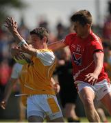 29 June 2013; Seán Kelly, Antrim, in action against Conor Rafferty, Louth. GAA Football All-Ireland Senior Championship, Round 1, Louth v Antrim, County Grounds, Drogheda, Co. Louth. Picture credit: Dáire Brennan / SPORTSFILE