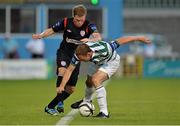 12 July 2013; Simon Madden, Derry City, in action against Stephen Rice, Shamrock Rovers. Airtricity League Premier Division, Shamrock Rovers v Derry City, Tallaght Stadium, Tallaght, Co. Dublin. Picture credit: Barry Cregg / SPORTSFILE