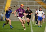 13 July 2013; Andrew Shore, Wexford, in action against Colm Galvin, Clare. GAA Hurling All-Ireland Senior Championship, Phase III, Clare v Wexford, Semple Stadium, Thurles, Co. Tipperary. Picture credit: Ray McManus / SPORTSFILE