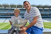13 July 2013; Former Dublin football star Ciarán Whelan was the latest to feature on the Bord Gáis Energy Legends Tour Series 2013 and ahead of the Leinster Senior Final he gave a unique tour of the Croke Park stadium and facilities. Pictured are Ciarán with his son Jamie, age 7. Other greats of the game still to feature this Summer on the Bord Gáis Energy Legends Tour Series include Steven McDonnell, Ken McGrath, Pat Gilroy and Noel Skehan. Full details and dates for the Bord Gáis Energy Legends Tour Series 2013 are available on www.crokepark.ie/events. Croke Park, Dublin. Picture credit: Barry Cregg / SPORTSFILE