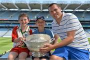 13 July 2013; Former Dublin football star Ciarán Whelan was the latest to feature on the Bord Gáis Energy Legends Tour Series 2013 and ahead of the Leinster Senior Final he gave a unique tour of the Croke Park stadium and facilities. Pictured at on the tour with Ciarán are David McKeon, left, age 7, and Cian Doyle, age 7, from Fingal, Co. Dublin. Other greats of the game still to feature this Summer on the Bord Gáis Energy Legends Tour Series include Steven McDonnell, Ken McGrath, Pat Gilroy and Noel Skehan. Full details and dates for the Bord Gáis Energy Legends Tour Series 2013 are available on www.crokepark.ie/events. Croke Park, Dublin. Picture credit: Barry Cregg / SPORTSFILE