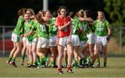 13 July 2013; Shauna Kelly, Cork, reacts after the game as the Kerry team celebrate. TG4 Ladies Football Munster Senior Championship Final, Kerry v Cork, Castletownroche, Cork. Picture credit: Diarmuid Greene / SPORTSFILE