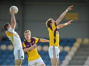 13 July 2013; JJ Matthews, Longford, in action against Michael Furlong, 2, and Robert Tierney, Wexford. GAA Football All-Ireland Senior Championship, Round 2, Longford v Wexford, Glennon Brothers Pearse Park, Longford. Picture credit: Matt Browne / SPORTSFILE