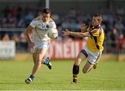 13 July 2013; Brendan McElvaney, Longford, in action against Adrian Flynn, Wexford. GAA Football All-Ireland Senior Championship, Round 2, Longford v Wexford, Glennon Brothers Pearse Park, Longford. Picture credit: Matt Browne / SPORTSFILE