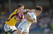 13 July 2013; Paul Barden, Longford, in action against David Murphy, Wexford. GAA Football All-Ireland Senior Championship, Round 2, Longford v Wexford, Glennon Brothers Pearse Park, Longford. Picture credit: Matt Browne / SPORTSFILE