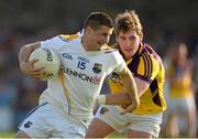 13 July 2013; JJ Matthews, Longford, in action against Robert Tierney, Wexford. GAA Football All-Ireland Senior Championship, Round 2, Longford v Wexford, Glennon Brothers Pearse Park, Longford. Picture credit: Matt Browne / SPORTSFILE