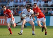 13 July 2013; Paddy Brophy, Kildare, in action against Dessie Finnegan, Louth. GAA Football All-Ireland Senior Championship, Round 2, Kildare v Louth, St Conleth's Park, Newbridge, Co. Kildare. Picture credit: Barry Cregg / SPORTSFILE