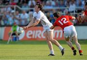 13 July 2013; Paddy Brophy, Kildare, in action against Adrian Reid, Louth. GAA Football All-Ireland Senior Championship, Round 2, Kildare v Louth, St Conleth's Park, Newbridge, Co. Kildare. Picture credit: Barry Cregg / SPORTSFILE